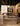 Arclinea Proxima kitchen detail with marble countertop, sink and suspended lighting