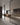 Sliding glass wall with convivium lapis luxury kitchen in brass