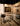 Arclinea Proxima kitchen island with marble surface, snack counter and metal stools