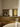 Arclinea modern kitchen with brass detail and marble table