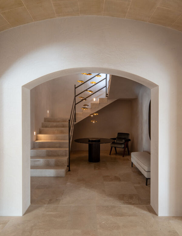 entrance with staircase and pendant lamps